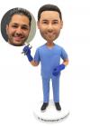 Custom bobbleheads dentist in navy scrubs