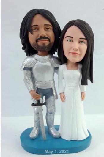 Custom bobbleheads prince defends his princess wedding gifts