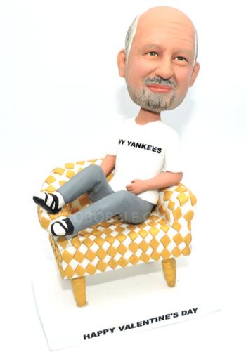 Custom bobbleheads man sitting on sofa