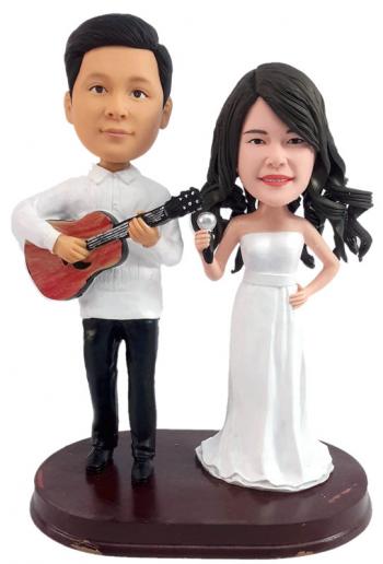 Custom bobbleheads couple groom playing guitar bride singing